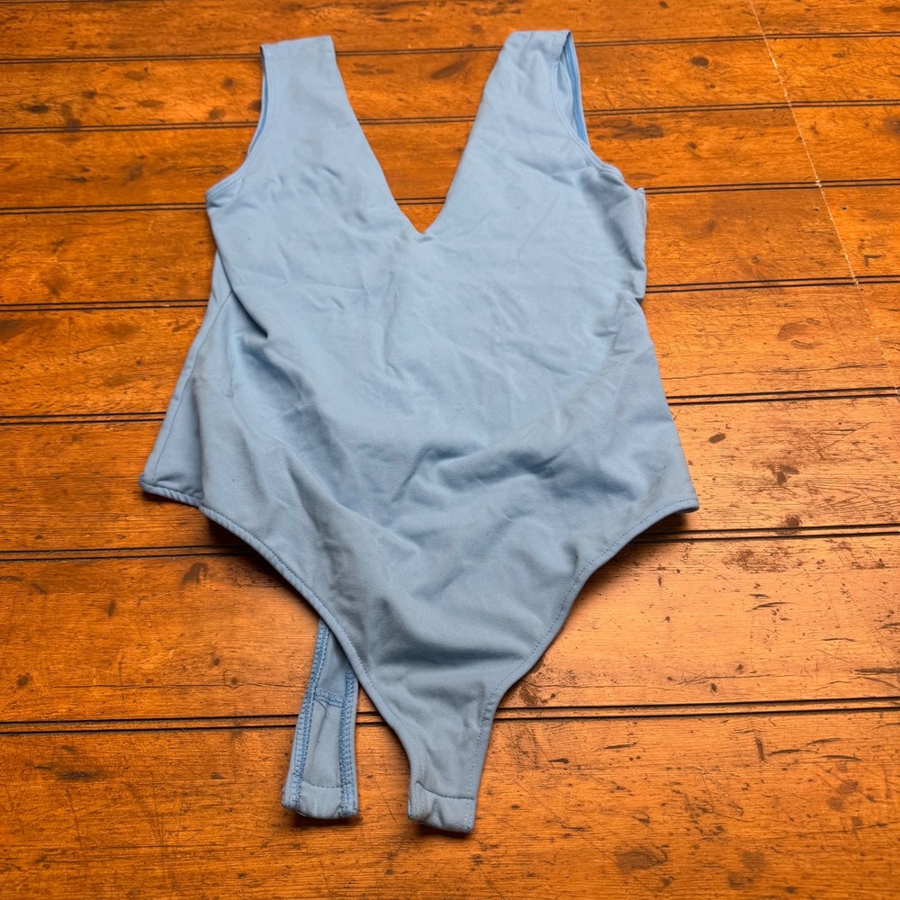 Free People Light Blue‎ V Neck Thong Bodysuit Snap Closure Women's Size medium